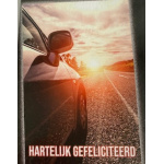 budget_kaart_auto_op_weg_in_zon